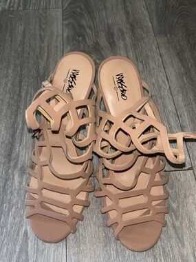 Worn strappy smelly heels